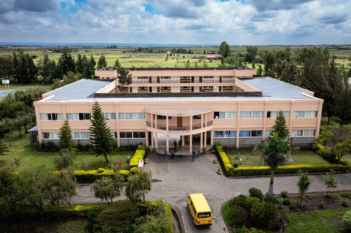 The Academic Centre from above, with a school van arriving at the entrance
