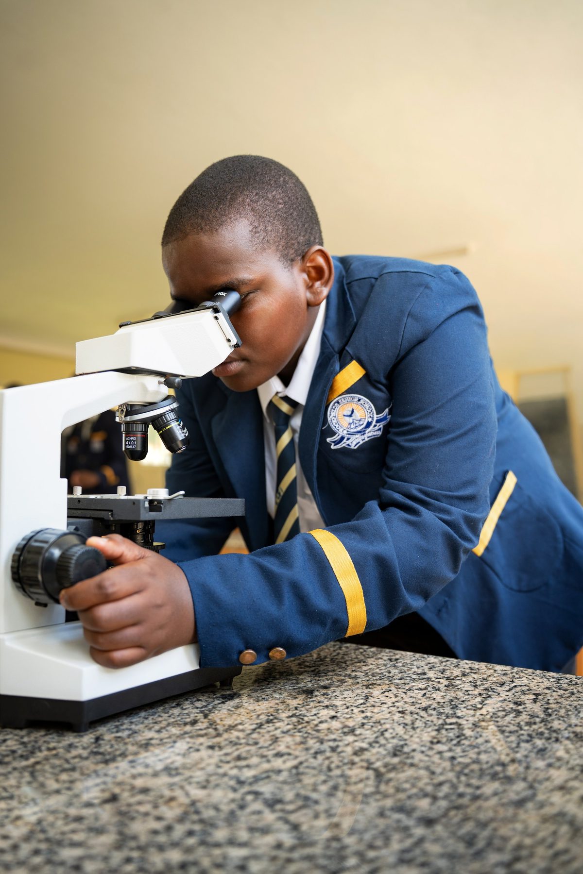 A student at a microscope